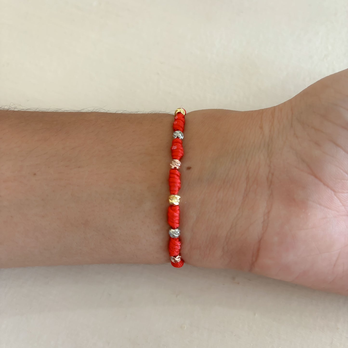 Pulsera 7 Nudos Rodinado